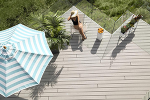 Gray-Composite-Decking-TimberTech-AZEK-Harvest-Collection-Slate-Gray-Sunny-Deck Aerial view of gray composite decking by TimberTech