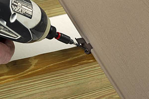 Detail view of TimberTech fastener securing a deck board to the substructure 