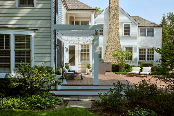 Deck ideas on multi-level home on sunny day