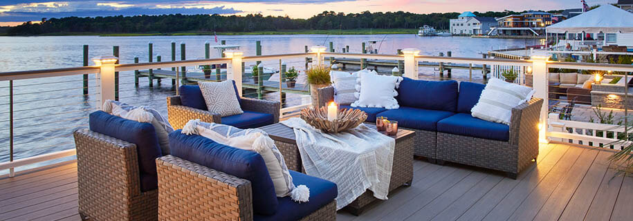 Outdoor fall decor ideas including deck railing lights