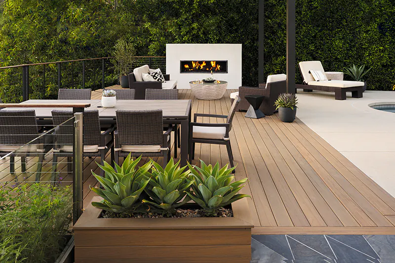 A deck built flush with a concrete patio.