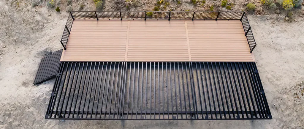 Deck build halfway finished with aluminum framing substructure exposed.