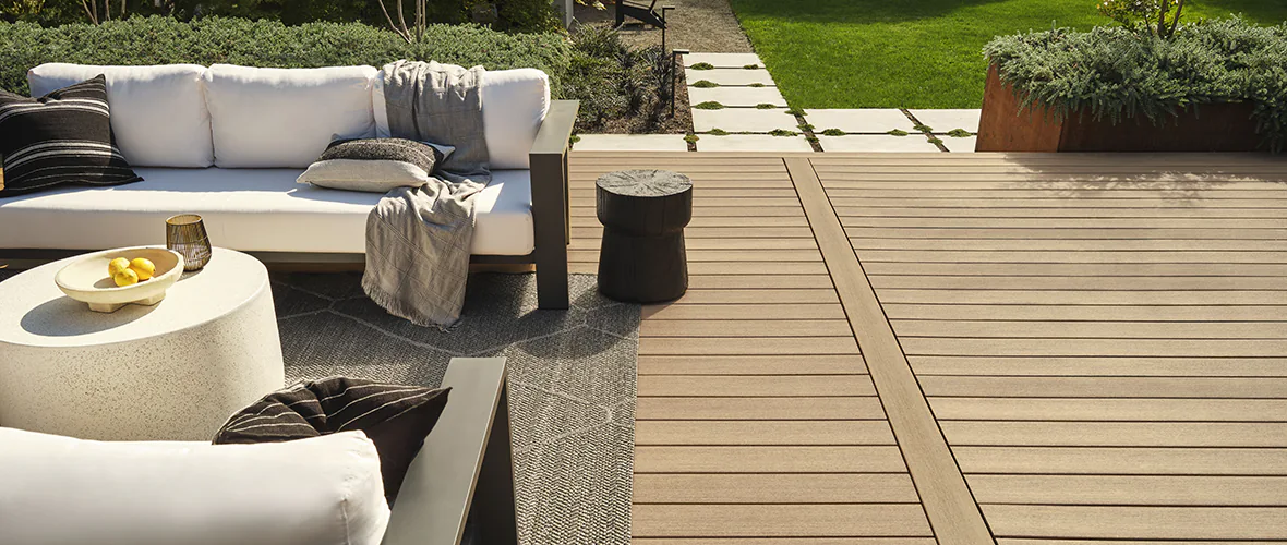 Light tan deck with couches.