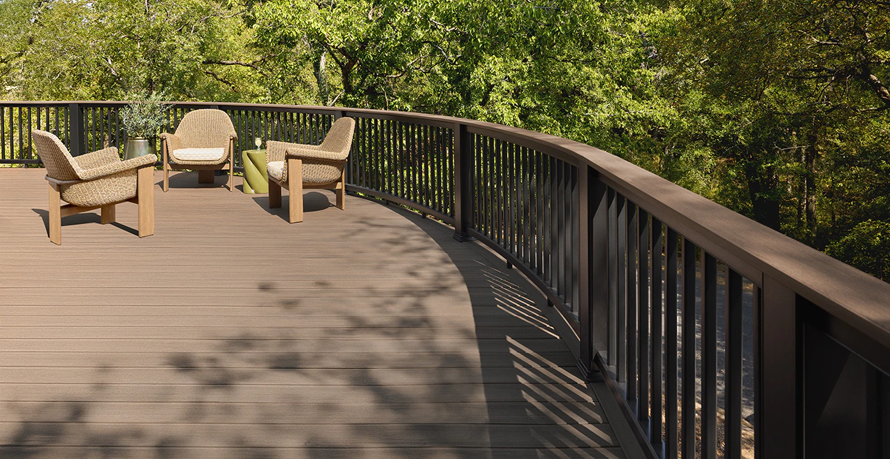 Photo showing the gentle curve of the first story of the deck and railing